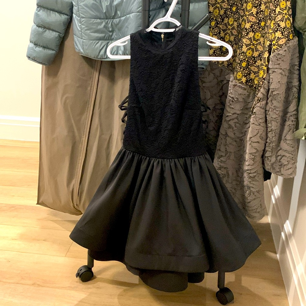 Size s Trac Little black lace dress with balloon skirt & lace up sides